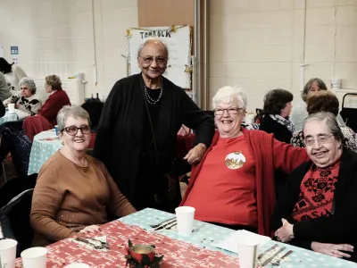 A table of older ladies at the Abbey Christmas Party